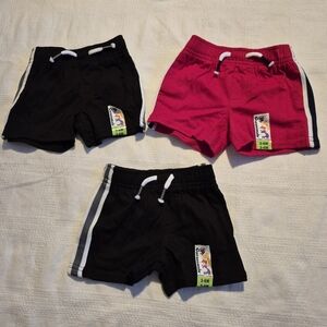 Garanimals baby shorts 3-6 months, 2 black, 1 red New
